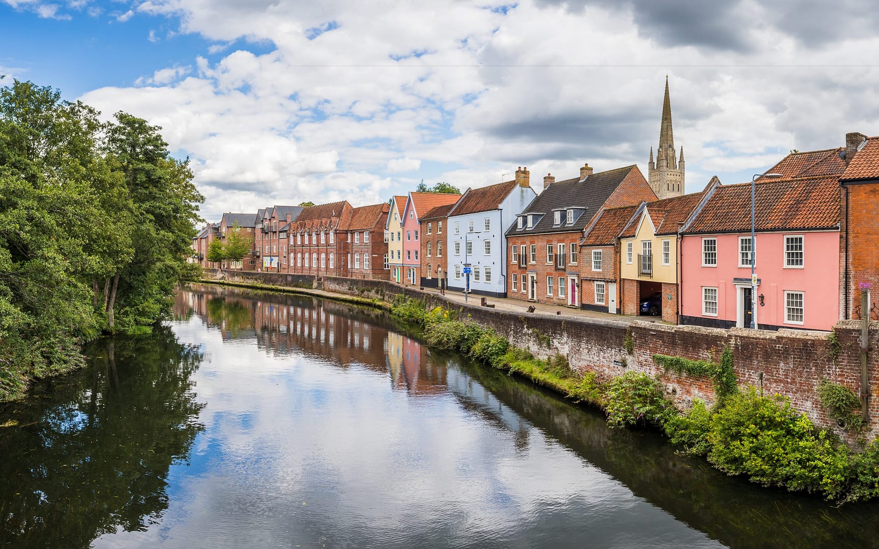 Row of Tudor shps next to the river Wensum in Norwich, England